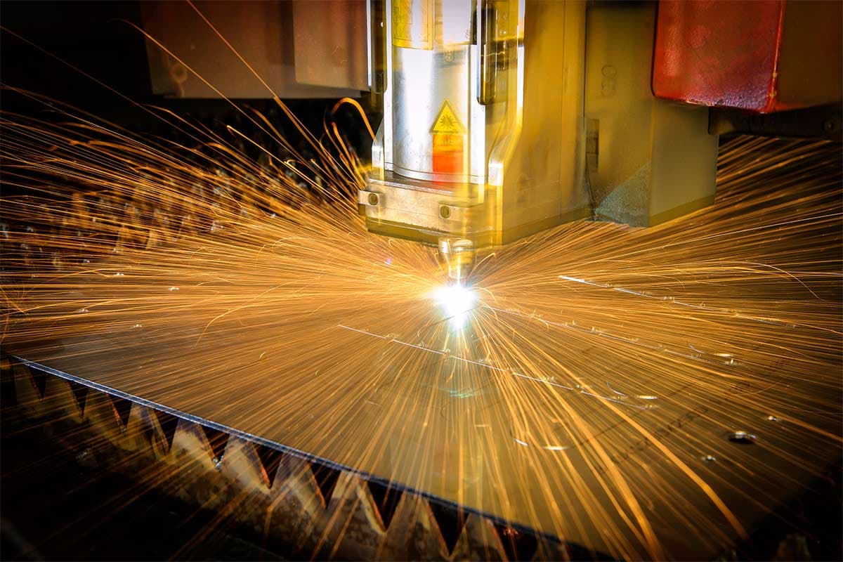 CNC fiber laser cutting machine in industrial setting